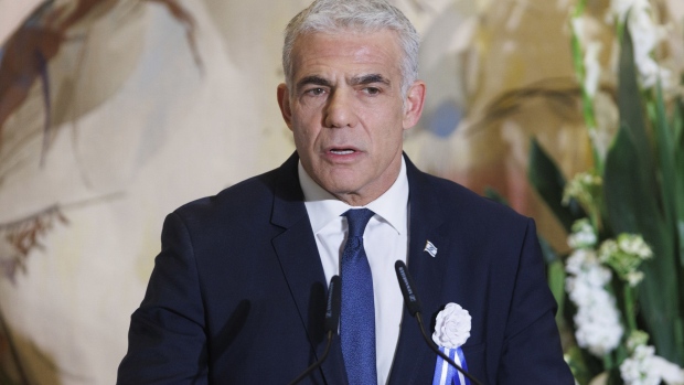 Yair Lapid, Israel's outgoing prime minister, speaks during a swearing in ceremony at the Knesset in Jerusalem, Israel, on Tuesday, Nov. 15, 2022. Having alienated other right-wing figures during his previous stints in power, incoming Prime Minister Benjamin Netanyahu is now dependent on Religious Zionism to hold power.