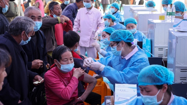 Elder residents receive Covid-19 vaccine in Chongqing in 2021. Source: STR/AFP/Getty Images