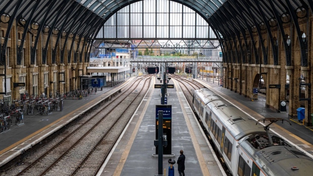 A rail passenger waits on a platform during a national rail strike at London King's Cross railway station in London, UK, on Wednesday, Oct. 5, 2022. Two rails unions planned walkouts on Oct. 5, when people will be making their way home from the Conservative Party Annual Conference in Birmingham.