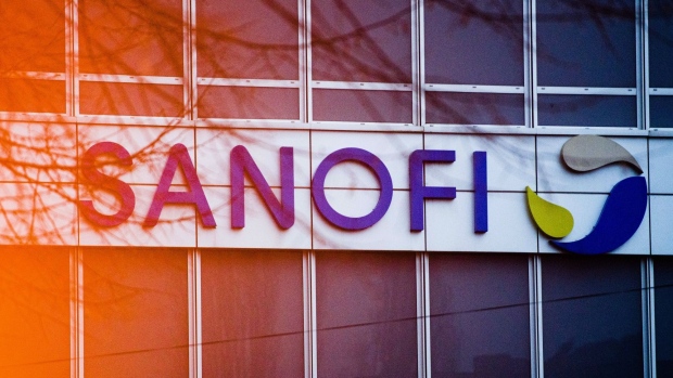 A logo at the Sanofi campus in the Gentilly district in Paris, France, on Thursday, Jan. 28, 2021. Sanofi agreed to produce millions of doses of BioNTech SE and Pfizer Inc.'s coronavirus vaccine in an unusual collaboration to speed vaccination efforts. Photographer: Nathan Laine/Bloomberg