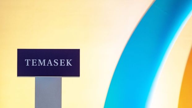 A signage of Temasek Holdings Pte., at the launch of Temasek Review 2022 in Singapore, on Tuesday, July 12, 2022. Temasek’s portfolio jumps 5.8% on fiscal year to $287 billion, and the company sees rising risk of mild US recession into 2023. Photographer: Edwin Koo/Bloomberg