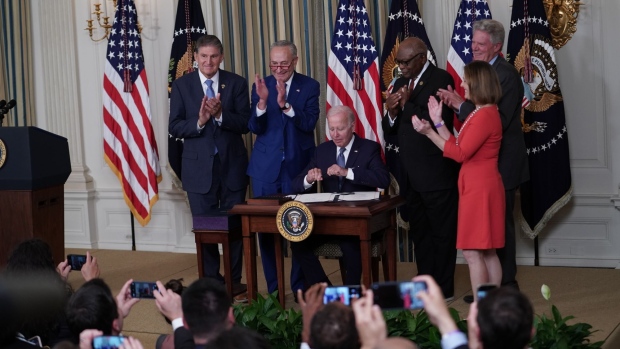 US President Joe Biden after signing H.R. 5376, the Inflation Reduction Act of 2022, in the State Dining Room of the White House in Washington, D.C., US, on Tuesday, Aug. 16, 2022. House Democrats last week delivered the final votes needed to send Biden a slimmed-down version of his tax, climate and drug price agenda, overcoming a year of infighting.