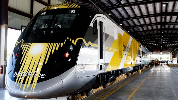 The All Aboard Florida Brightline express inter-city train is displayed during a media tour in West Palm Beach, Florida, U.S., on Wednesday, Jan. 11, 2017. The Brightline Express project is a $1.5 billion investment that will bring high speed train travel to commuters from Orlando to Miami. Photographer: Scott McIntyre/Bloomberg