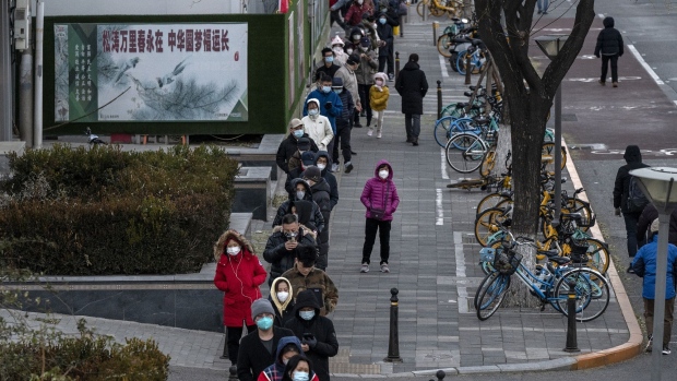 Residents line up to be tested for Covid-19 in Beijing on Nov. 30.