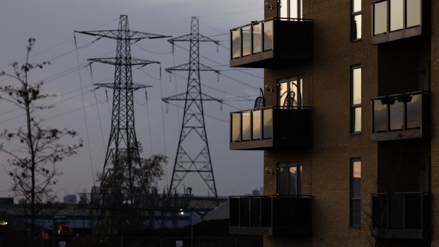 Residential apartments next to electricity pylons on the Barking Riverside development in London, UK, on Wednesday, Nov. 23, 2022. Barking and Dagenham is the only remaining London borough where house prices in the resale market have risen by double digits. Photographer: Chris Ratcliffe/Bloomberg