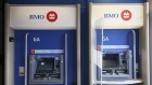 Automated teller machines (ATMs) at a Bank of Montreal (BMO) bank branch in Montreal, Quebec, Canada, on Thursday, April 28, 2022. Five Canadian banks had their price targets cut an average of 6% at RBC Capital Markets on prospects that escalating macro risks could weigh on profits.