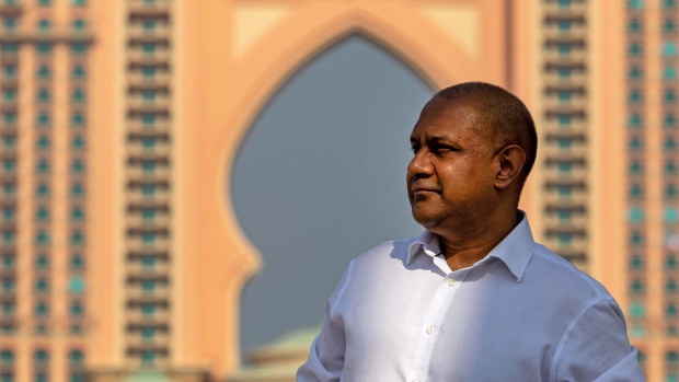 Sanjay Shah, chief executive officer of Elysium Global Ltd., poses for a photograph in front of the Atlantis Hotel on the Palm Jumeriah in Dubai, United Arab Emirates, on Tuesday, Sept. 29, 2020. Shah charted a spectacular rise from trading-floor obscurity to amassing as much as $700 million and a property portfolio that stretched from Regent’s Park in his native London to Dubai.