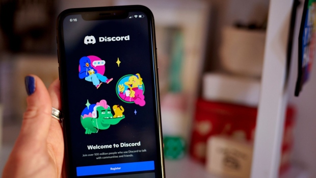 The Discord website on a smartphone arranged in the Brooklyn borough of New York, US, on Friday, Nov. 18, 2022. Elon Musk’s purchase of Twitter Inc. is sending some users searching for alternative platforms - with mixed success. Photographer: Gabby Jones/Bloomberg