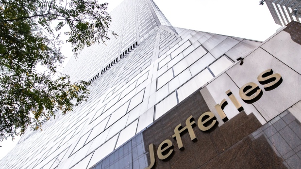 Signage outside the Jefferies Financial Group offices in New York, U.S., on Wednesday. Oct. 13, 2021. Jefferies, which has been expanding in Asia in recent years, saw its global revenue rise by 50% to a record $5.4 billion in the first nine months of the year. Photographer: Jeenah Moon/Bloomberg