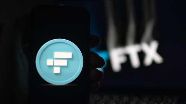 The FTX Cryptocurrency Derivatives Exchange logo on a digital device arranged in Riga, Latvia, Nov. 24, 2022. The implosion of Sam Bankman-Fried’s FTX empire dealt a harsh blow to the Bahamas’ ambitions to be a hub for the crypto industry, and it’s causing massive pain for locals who treated the now-bankrupt exchange like a bank. Photographer: Andrey Rudakov/Bloomberg