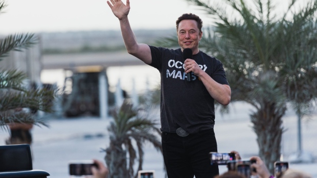 Elon Musk, co-founder and chief executive officer of Space Exploration Technologies Corp. (SpaceX) and Tesla Inc., during a news conference with Mike Sievert, president and chief executive officer of T-Mobile US Inc., not pictured, at the SpaceX Starbase facility in Boca Chica, Texas, US, on Thursday, Aug. 25, 2022. T-Mobile is partnering with Elon Musk’s SpaceX to offer wireless phone service in remote parts of the US where coverage is spotty.