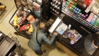 A customer places items on a conveyor belt whiling at a checkout counter at Harmons Grocery store in Salt Lake City, Utah, U.S., on Thursday, Oct. 21, 2021. More than a year and a half after the coronavirus pandemic upended daily life, the supply of basic goods at U.S. grocery stores and restaurants is once again falling victim to intermittent shortages and delays. Photographer: George Frey/Bloomberg