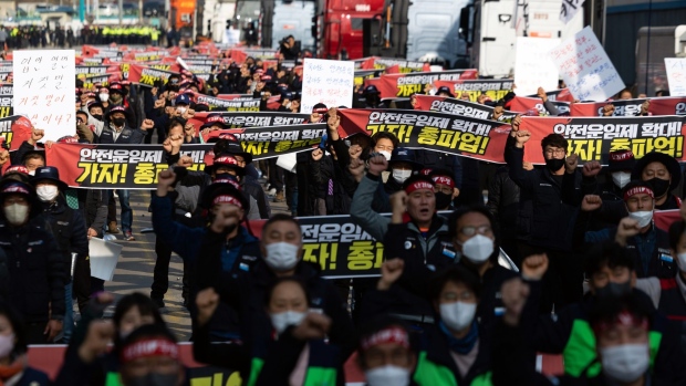 Truck drivers and members of the Korean Confederation of Trade Unions during a protest at the Uiwang Inland Container Depot in Uiwang, South Korea, on Nov. 24.