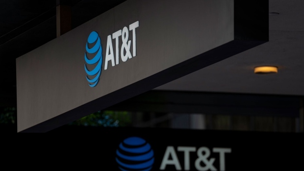 Signage for an AT&T store in San Francisco, California, U.S., on Monday, Jan. 25, 2021. AT&T Inc. is expected to release earnings figures on January 27. Photographer: David Paul Morris/Bloomberg