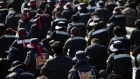 Truck drivers and members of the Korean Confederation of Trade Unions shout slogans during a protest at the Uiwang Inland Container Depot in Uiwang, South Korea, on Thursday, Nov. 24, 2022. Truck drivers are on strike in South Korea for the second time in less than a year, targeting major ports in a bid to disrupt key exports from autos to petrochemicals.