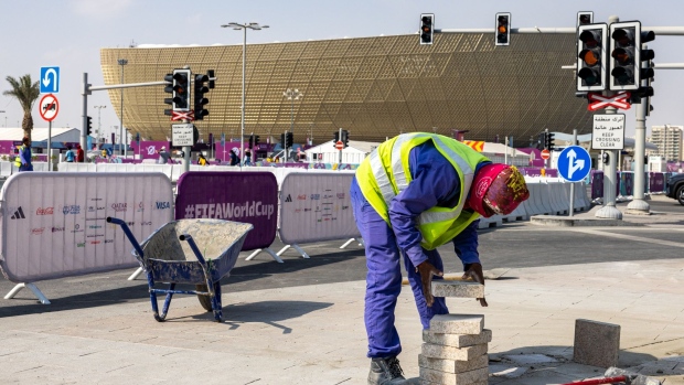 A labourer works outside Lusail Stadium in Doha in Nov.