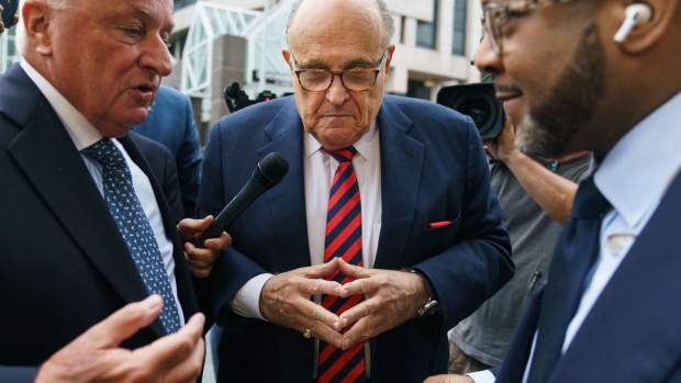 Rudy Giuliani, former lawyer to Donald Trump, and his attorney Robert Costello, left, arrive at Fulton County Superior Court in Atlanta, Georgia, US, on Wednesday, Aug. 17, 2022. Giuliani, who was a lead lawyer in then-President Donald Trump's attempts to overturn Joe Biden's 2020 election victory, is scheduled to testify on Wednesday before a grand jury in Atlanta investigating possible efforts to interfere with Georgia's vote.
