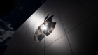 The Apple logo on a store in San Francisco, California, U.S., on Monday, April 26, 2021. Apple Inc. is increasing its U.S. investments by 20% over the next five years, allocating $430 billion to develop next-generation silicon and spur 5G wireless innovation across nine U.S. states, after outstripping its growth expectations during the pandemic.