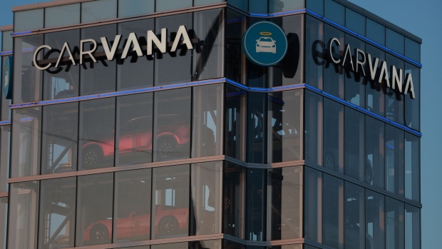 MIAMI, FLORIDA - MAY 11: A Carvana used car "vending machine" on May 11, 2022 in Miami, Florida. Carvana Co. announced it is letting go about 2,500 workers, a few weeks after the company posted a $506 million loss in the first quarter. (Photo by Joe Raedle/Getty Images)