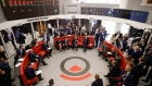 Traders on the trading floor of the open outcry pit at the London Metal Exchange Ltd. (LME) in London, U.K., on Monday, Sept. 6, 2021. After 18 months away, brokers returned Monday to the red leather couches of the London Metal Exchange’s floor, where they set benchmark prices of metals such as copper and aluminum by screaming orders at one another.