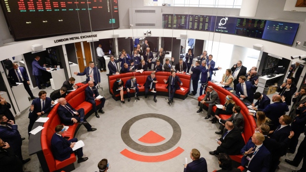 Traders on the trading floor of the open outcry pit at the London Metal Exchange Ltd. (LME) in London, U.K., on Monday, Sept. 6, 2021. After 18 months away, brokers returned Monday to the red leather couches of the London Metal Exchange’s floor, where they set benchmark prices of metals such as copper and aluminum by screaming orders at one another.