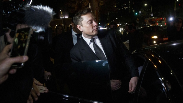 Elon Musk departs from federal court in Los Angeles, on Dec. 3, 2019.