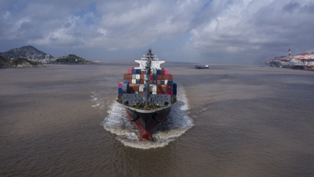 The container ship NYK Daniella sails out of the Yangshan Deepwater Port in Shanghai, China, on Saturday, Oct. 9, 2021. China's trade figures are scheduled to be released on Oct. 13. Photographer: Qilai Shen/Bloomberg
