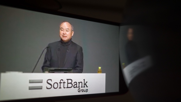 Masayoshi Son, chairman and chief executive officer of SoftBank Group Corp., speaking in Tokyo during a virtual earnings announcement, arranged in Naha, Japan, on Tuesday, Feb. 8, 2022. SoftBank Group said it plans an initial public offering for Arm Ltd. after Nvidia Corp. abandoned a proposed acquisition of the chip designer in the face of fierce opposition from regulators and customers.