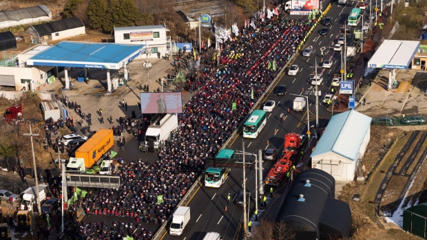 A protest by the Korean Confederation of Trade Unions (KCTU) members in Uiwang, South Korea, on Tuesday, Dec. 6, 2022. A major umbrella union joined a protest by South Korean truckers, broadening a work stoppage that is disrupting global supply chains and hitting local exporters.