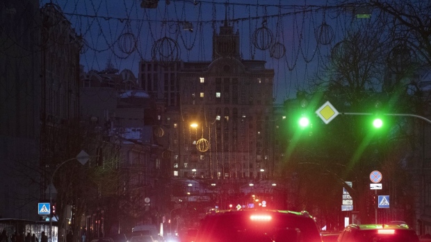 Motorists wait in traffic during a power outage in Kyiv, Ukraine, on Tuesday, Dec. 6, 2022. Ukrainians have been no strangers to hardship over the past century, but their dogged resilience and solidarity in the face of Russian bombardment has been an enduring image of a war that started at the tail end of last winter.
