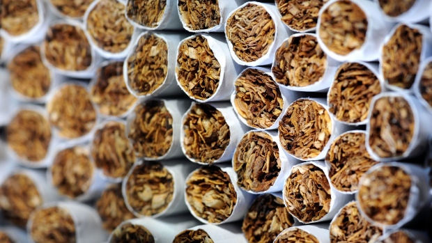US consumers are increasingly switching to lower-priced cigarette brands as higher living costs reduce disposable income. Photographer: Robert Gilhooly/Bloomberg