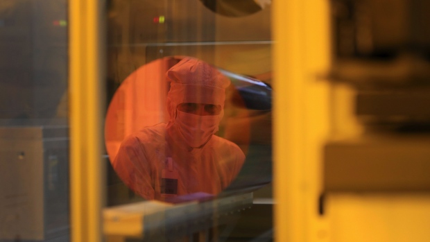 A 300mm wafer during the manufacturing process at the Robert Bosch GmbH semiconductor fabrication plant (FAB) in Dresden, Germany, in Dresden, Germany, on Monday, May 31, 2021. Bosch agreed to cooperate with Globalfoundries — an Abu Dhabi-owned chip manufacturer with plants in the U.S., Singapore and Germany — to develop automotive radar semiconductors that should hit the market in the second half of this year. Photographer: Krisztian Bocsi/Bloomberg
