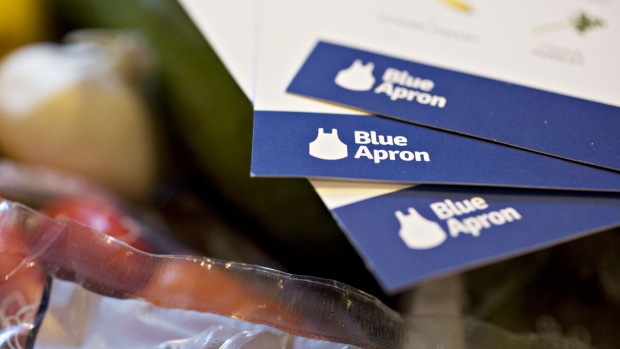 Recipe cards from a Blue Apron Holdings Inc. meal-kit delivery are arranged for a photograph in Tiskilwa, Illinois, U.S., on Wednesday, June 14, 2017. Blue Apron Holdings Inc. filed for an initial public offering in the U.S., after reportedly delaying listing preparations while it worked to improve financials. Photographer: Daniel Acker/Bloomberg