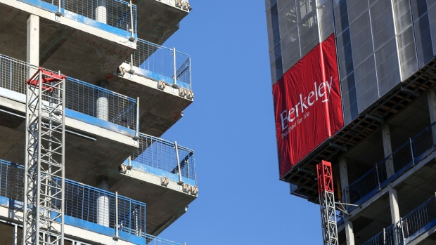 The Berkeley Group Holdings Plc company logo is displayed on the side of a block of residential apartments under construction at the company's Woodberry Down development in London, U.K., on Friday, Jan. 20, 2017. Berkeley rose the most in almost three months after London's biggest homebuilder reported a 34 percent increase in pretax profit and set new five-year earnings targets.