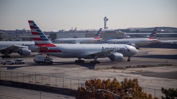 American Airlines airplanes parked at John F. Kennedy International Airport (JFK) ahead of the Thanksgiving holiday in New York, US, on Wednesday, Nov. 23, 2022. Planes and airports are expected to be bustling this Thanksgiving, traditionally one of the most traveled holidays of the year.