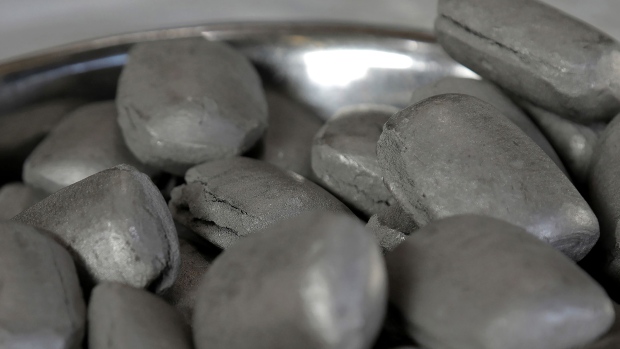 Nickel briquettes sit in a bowl for a photograph at the BHP Group Ltd. Kwinana Nickel Refinery in Kwinana, Western Australia, Australia, on Friday, Aug. 2, 2019. The world's biggest miners, including BHP Group and Glencore Plc, are finally firm believers in the electric vehicle battery revolution -- what they don't agree on is which metals will deliver the best long-term exposure to the developing global market. Photographer: Philip Gostelow/Bloomberg