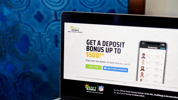 The website home screen for DraftKings is displayed on a laptop computer in an arranged photograph taken in Brooklyn borough of New York, U.S., Friday, Oct. 9, 2020. The pricing of a DraftKings Inc. share sale combined with a fresh wave of Covid-19 infections across the National Football League sent shares of the online gaming company tumbling this week. Photographer: Gabby Jones/Bloomberg