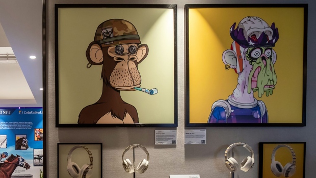 The physical artwork of "Bored Ape #2967" created by Bored Ape Yacht Club, left, and "Mutant Ape #1933" created by Mutant Ape Yacht Club, both available for sale as an NFT, displayed at a CoinUnited cryptocurrency exchange in Hong Kong. Photographer: Paul Yeung/Bloomberg