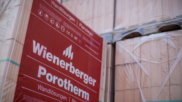 The logo of Wienerberger AG sits on the packaging of Porotherm insulated bricks ready for shipment at the Wienerberger AG brickmaking plant in Haiding, Austria, on Monday, Aug. 28, 2017. Heimo Scheuch, Chief Executive Officer of Wienerberger AG said he was "satisfied with the good results of the Wienerberger Group" in the first half of 2017. Photographer: Lisi Niesner/Bloomberg