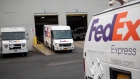 A delivery truck leaves a FedEx Express facility on Cyber Monday in Garden City, New York, US, on Monday, Nov. 28, 2022. US retailers showed modest sales growth over Black Friday weekend, using deep discounts to lure shoppers stung by the rising cost of living. Cyber Monday results will paint a fuller picture of demand this holiday season, analysts say. Photographer: Michael Nagle/Bloomberg