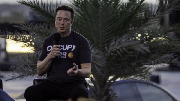 Elon Musk speaks during in Boca Chica Beach on Aug. 25. Photographer: Michael Gonzalez/Getty Images North America