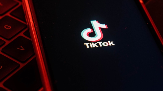 The logo for ByteDance Ltd.'s TikTok app is arranged for a photograph on a smartphone in Hong Kong.