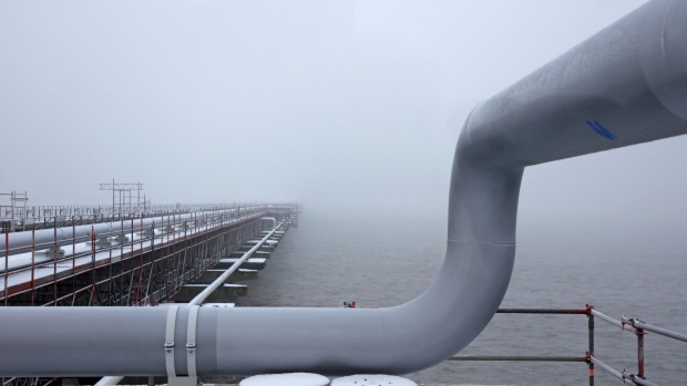 Gas pipes on the jetty at the Wilhelmshaven LNG Terminal, operated by Uniper SE, in Wilhelmshaven, Germany, on Thursday, Dec. 17, 2022. Germany opened its first state-chartered liquefied natural gas vessel as Europe's largest economy races to replace Russian gas amid an energy crunch and freezing temperatures. Photographer: Liesa Johannssen/Bloomberg