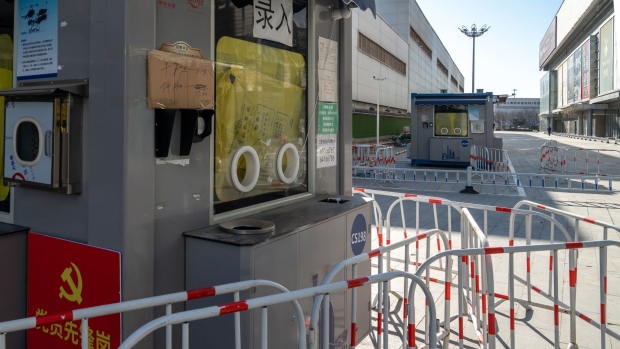 Covid testing booths in Beijing on Dec. 23. China’s National Health Commission said on Sunday it will stop publishing daily Covid surveillance data, which was seen as widely underestimating the illness’s explosive spread following Beijing’s abrupt pivot from its Covid Zero policy earlier this month.