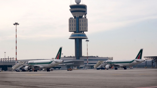 MILAN - FEBRUARY 04: Alitalia aircraft parking at Milan Malpensa Airport on February 04, 2009 in Milan, Italy. (Photo by Massimo Di Nonno/Getty Images)