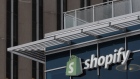Signage on Shopify's former headquarters in Ottawa, Ontario, Canada, on Thursday, Feb. 17, 2022. Canadian e-commerce company Shopify Inc. had the average price target on its shares slashed to the lowest level since January 2021 after it signaled slower sales growth.