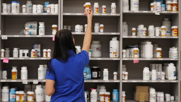 MIDVALE, UT - SEPTEMBER 10: A pharmacy technician grabs a bottle of drugs off a shelve at the central pharmacy of Intermountain Heathcare on September 10, 2018 in Midvale, Utah. IHC along with other hospitals and philanthropies are launching a nonprofit generic drug company called "Civica Rx" to help reduce cost and shortages of generic drugs. (Photo by George Frey/Getty Images)
