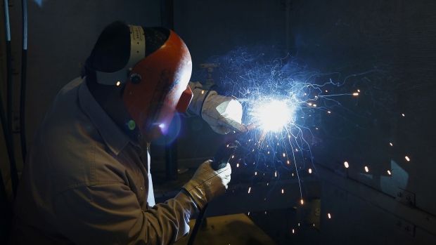 Instructor demonstrates welding during a class at San Jacinto College in Pasadena, Texas, U.S. Photographer: Aaron M. Sprecher