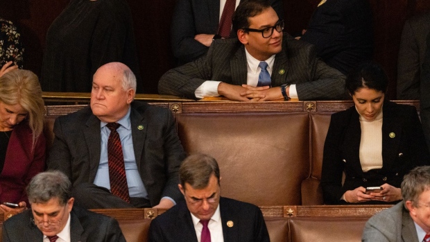 New York Republican George Santos, , top center, watches members vote for Speaker of the House in Washington.