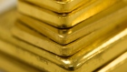 A selection of gold bars of various weights sit at Gold Investments Ltd. bullion dealers in this arranged photograph in London, U.K., on Wednesday, July 29, 2020. Gold held its ground after a record-setting rally as investors awaited the outcome of a Federal Reserve meeting amid expectations policy makers will remain dovish, potentially spurring more gains. Photographer: Chris Ratcliffe/Bloomberg
